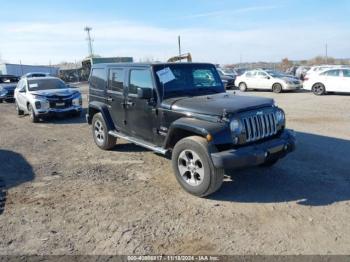  Salvage Jeep Wrangler