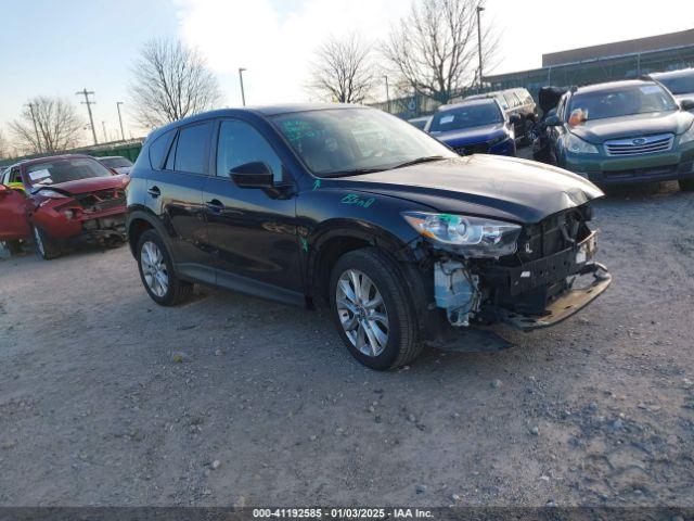  Salvage Mazda Cx