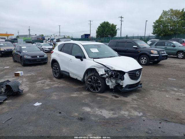  Salvage Mazda Cx